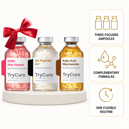 TryCure Trio Ampoule Kit with PDRN, peptide and kojic acid bottles and a red bow.